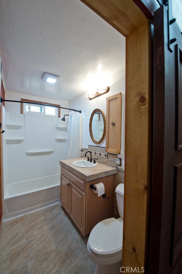 156 West Escalones San Clemente, CA 92672 - Photo 6 of 39 a bathroom with a toilet sink and mirror