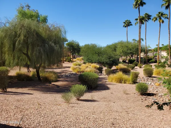 a view of a street with cars