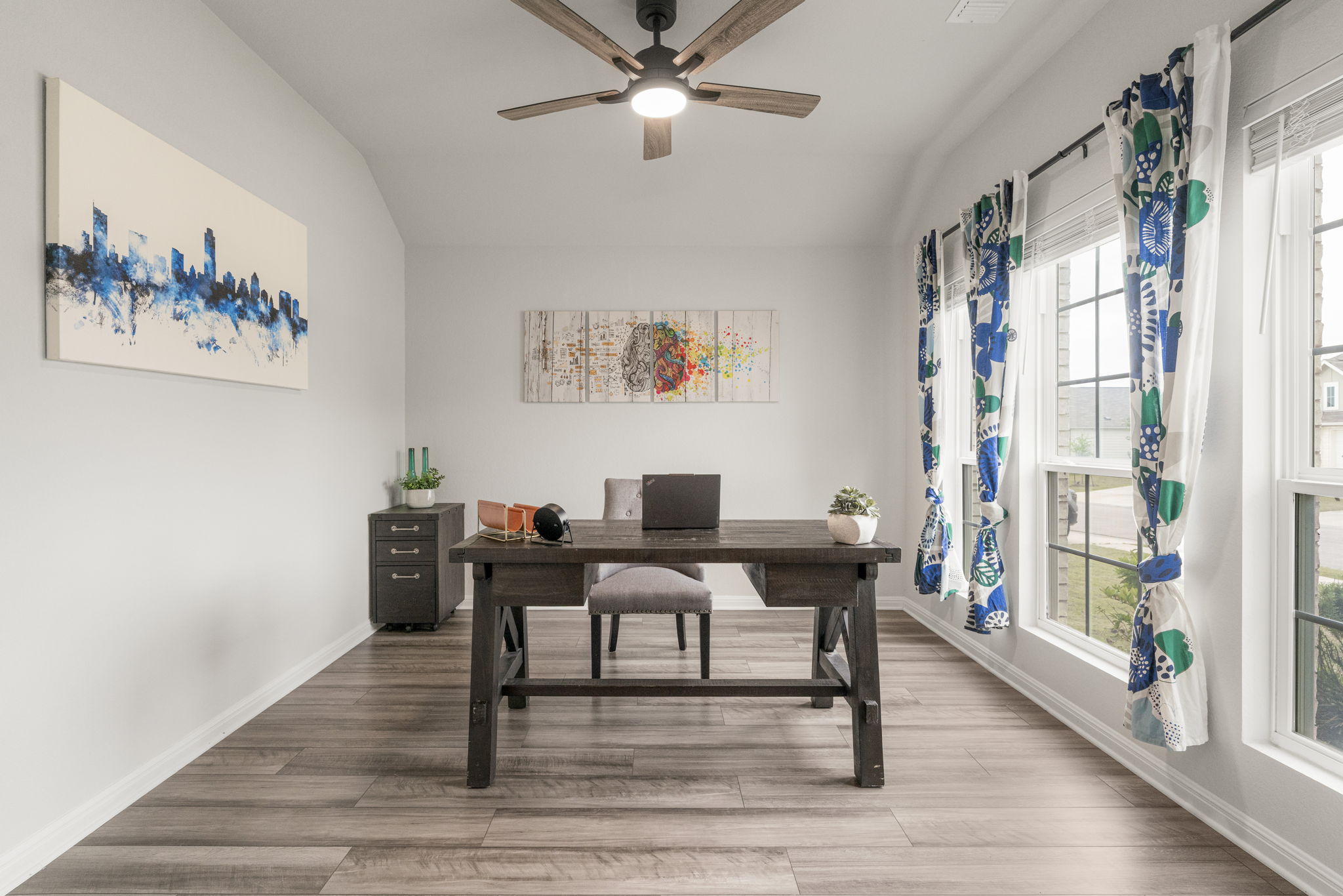 19412 Forman Drive Pflugerville, TX 78660 - Photo 18 of 34 This versatile room can easily serve as a home office, study, library, or hobby space depending on your needs.