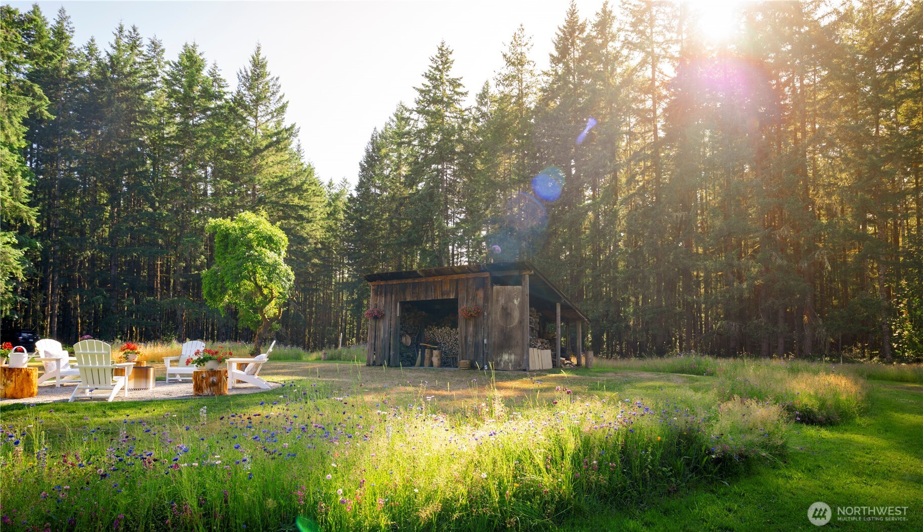 19680 Noll Road Northeast Poulsbo, WA 98370 - Photo 24 of 37 a view of swimming pool with a garden