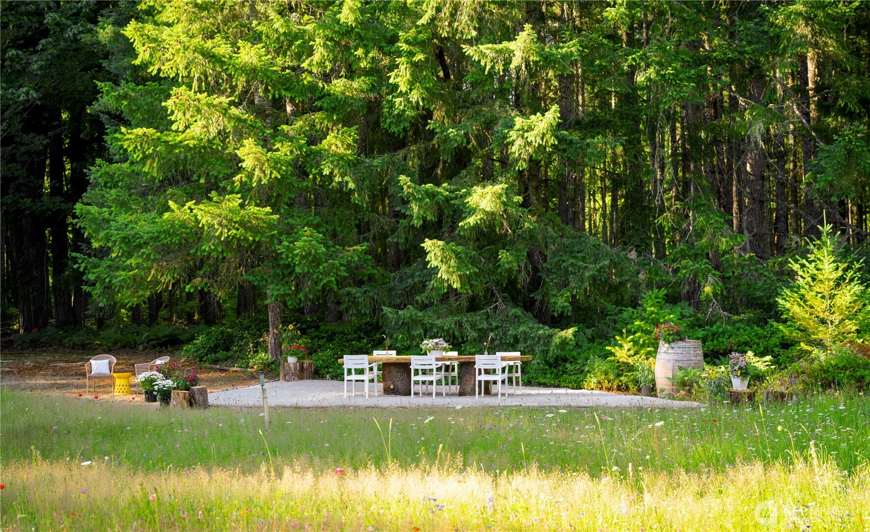 19680 Noll Road Northeast Poulsbo, WA 98370 - Photo 30 of 37 a view of swimming pool with a yard and large trees