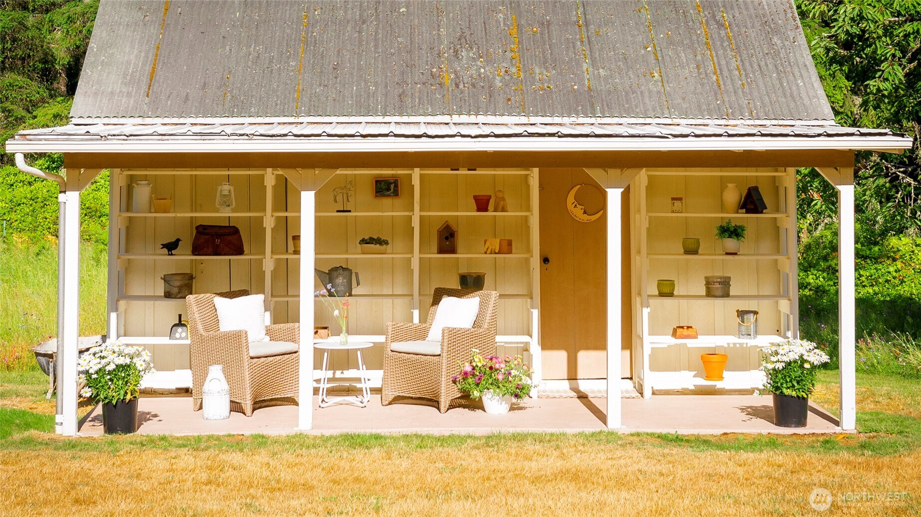 19680 Noll Road Northeast Poulsbo, WA 98370 - Photo 4 of 37 a view of a swimming pool with outdoor seating