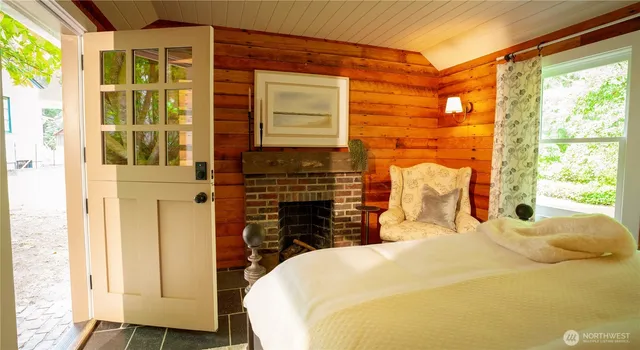 a backyard of a house with yard and outdoor seating