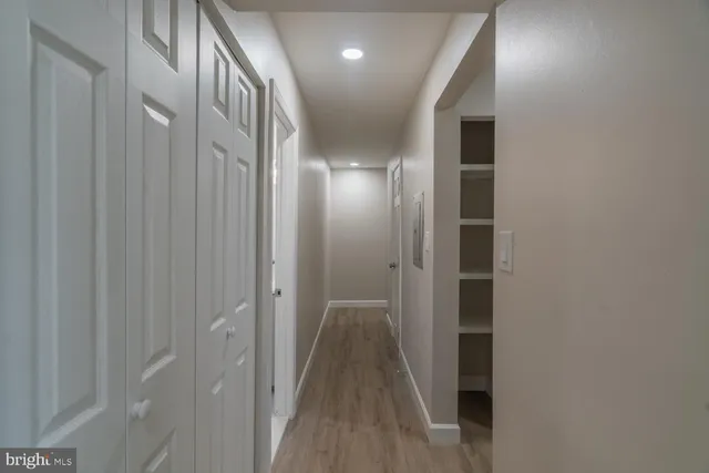 a view of hallway with windows