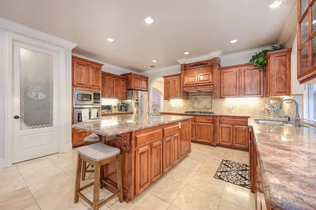 a bathroom with a sink toilet and mirror
