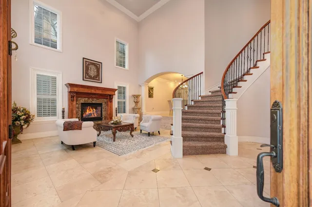 a view of entryway and hall with dining room