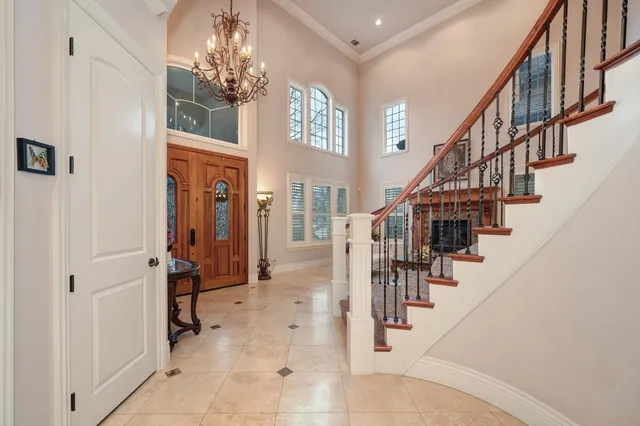 a living room with furniture a window and a fireplace