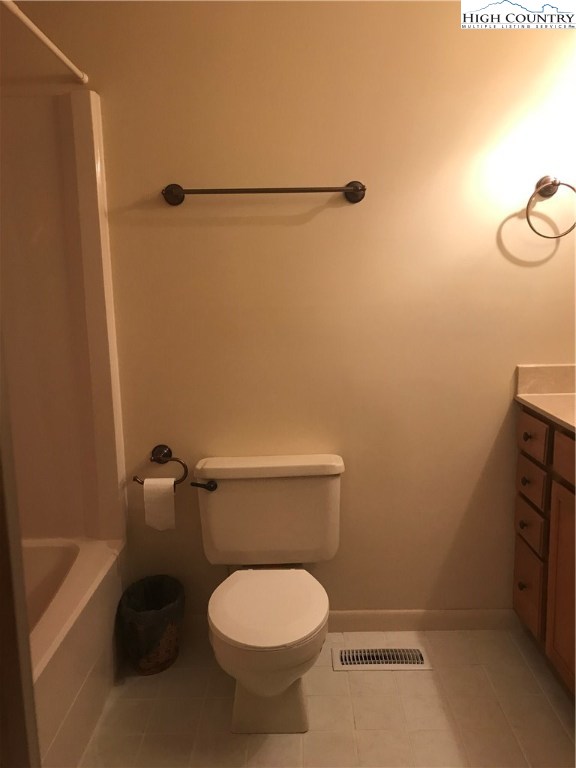 1307 Ben Miller Road Deep Gap, NC 28618 - Photo 13 of 26 a bathroom with a toilet and a shower