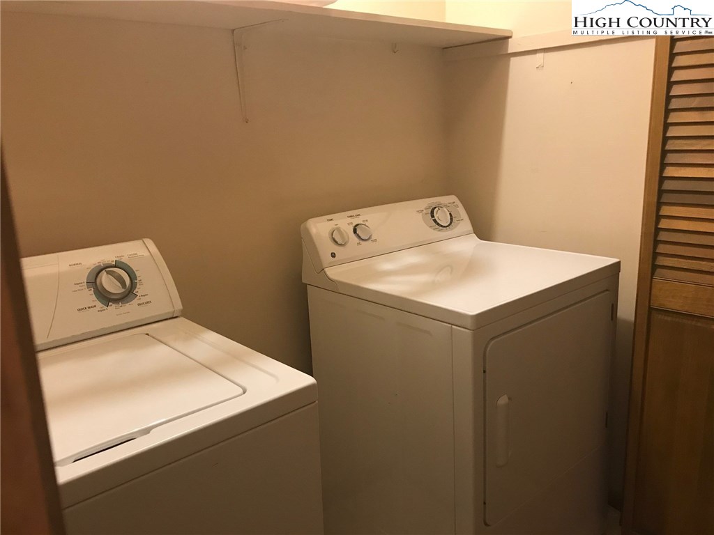 1307 Ben Miller Road Deep Gap, NC 28618 - Photo 14 of 26 a utility room with dryer and washer