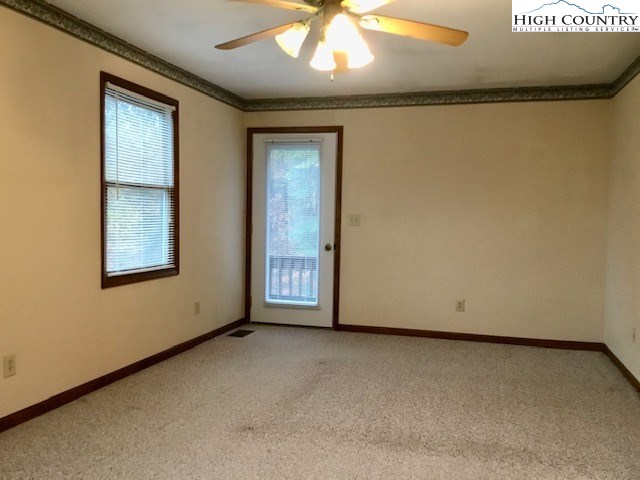 1307 Ben Miller Road Deep Gap, NC 28618 - Photo 18 of 26 a view of an empty room with a window