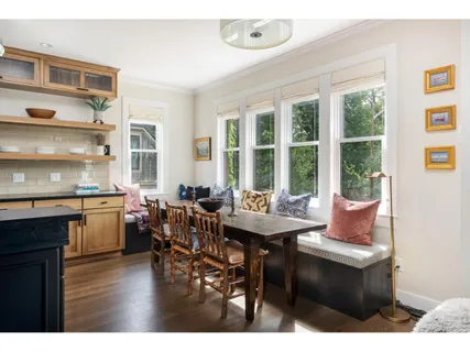 a view of a dining room with furniture window and outside view