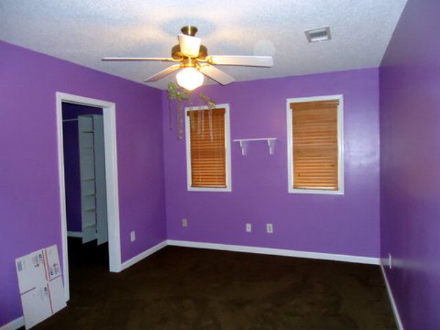 3090 Hamlin Road Lizella, GA 31052 - Photo 12 of 18 a view of a livingroom with a fan a ceiling fan and a window