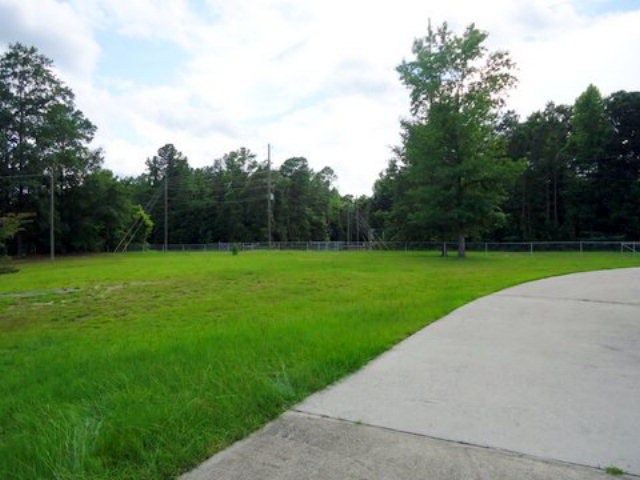 3090 Hamlin Road Lizella, GA 31052 - Photo 17 of 18 a view of a park with trees in the background