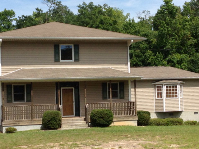 3090 Hamlin Road Lizella, GA 31052 - Photo 18 of 18 a view of a house with a yard