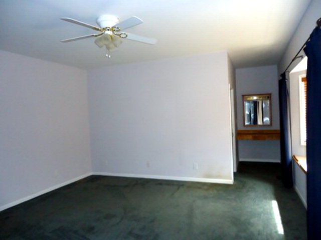 3090 Hamlin Road Lizella, GA 31052 - Photo 5 of 18 a view of an empty room with a window