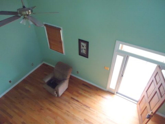 3090 Hamlin Road Lizella, GA 31052 - Photo 8 of 18 a wooden floor in a room