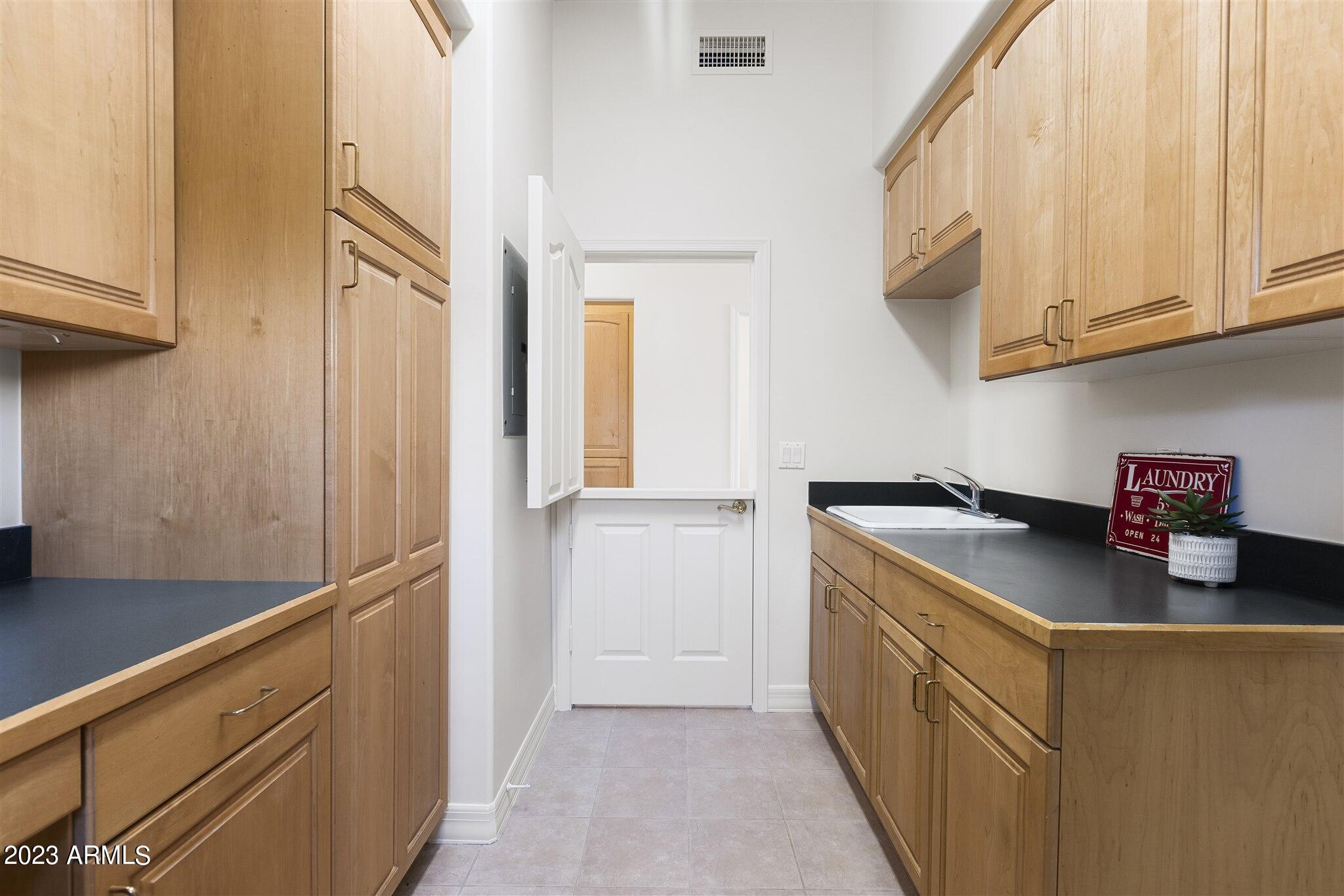 155 North Riata Street Gilbert, AZ 85234 - Photo 36 of 63 Huge Laundry Room