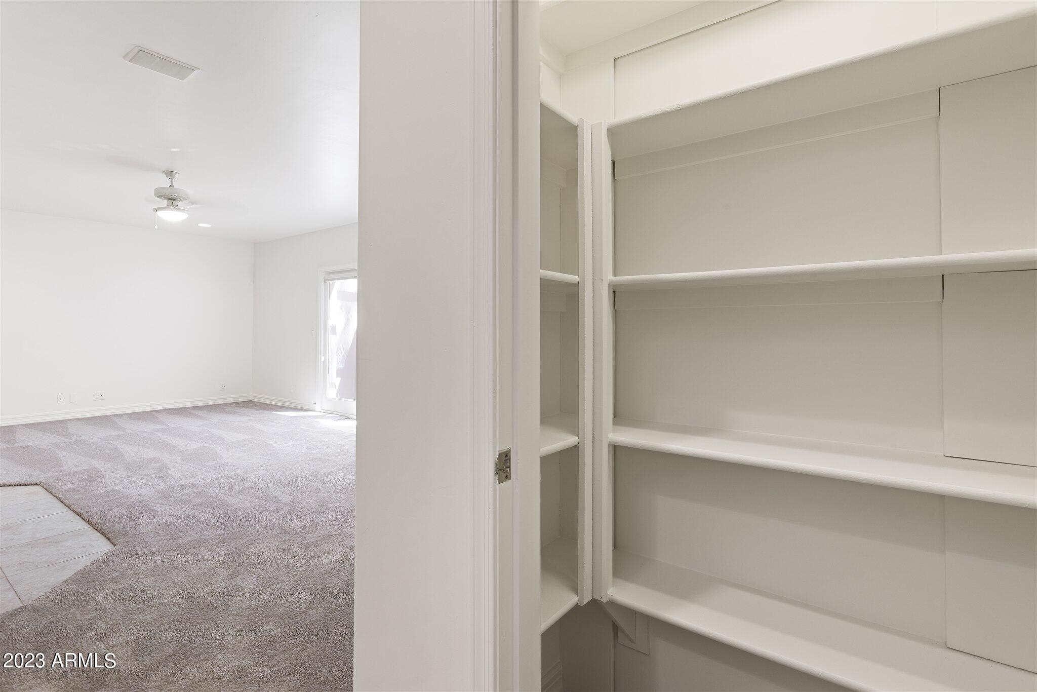 155 North Riata Street Gilbert, AZ 85234 - Photo 47 of 63 Add'l Stg w/Secret Room behind