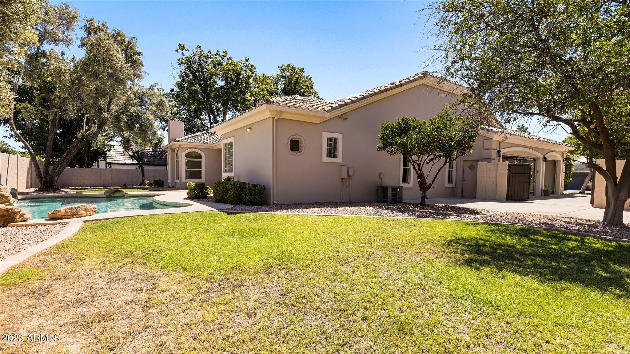 155 North Riata Street Gilbert, AZ 85234 - Photo 54 of 63 Add'l Pavement behind Gate
