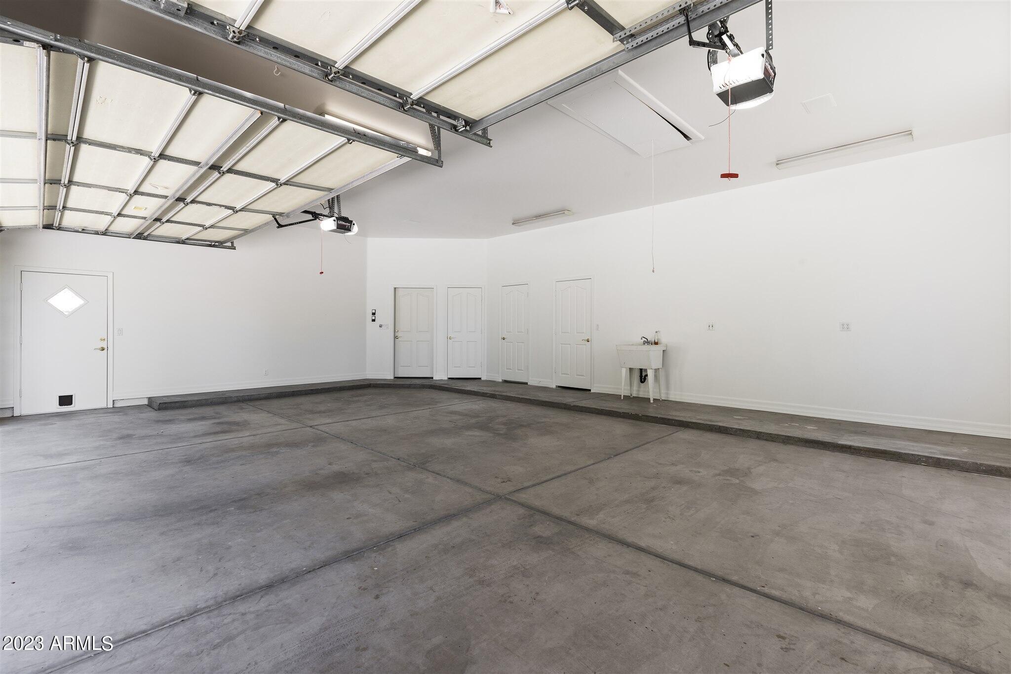 155 North Riata Street Gilbert, AZ 85234 - Photo 57 of 63 3 car Garage