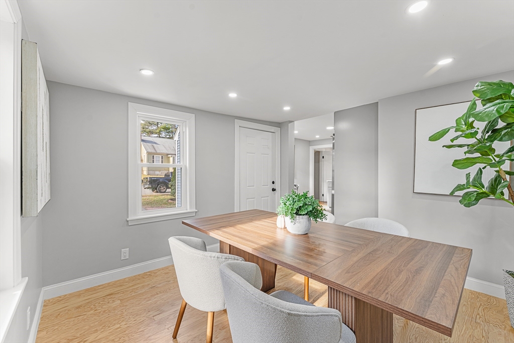 7 Webster Street Randolph, MA 02368 - Photo 13 of 32 a view of a dining room with furniture and wooden floor