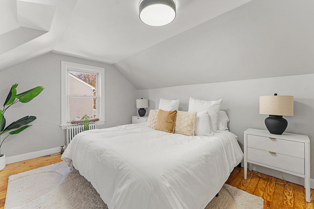 7 Webster Street Randolph, MA 02368 - Photo 16 of 32 a bedroom with a bed and window