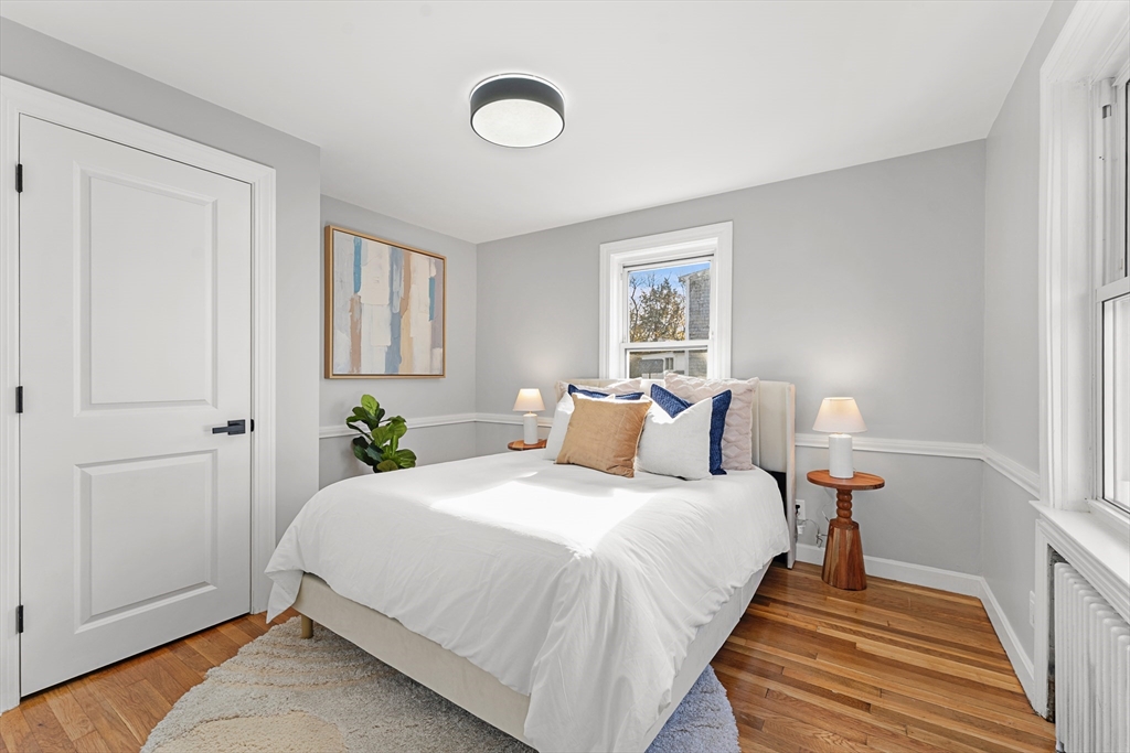 7 Webster Street Randolph, MA 02368 - Photo 19 of 32 a bedroom with bed and window