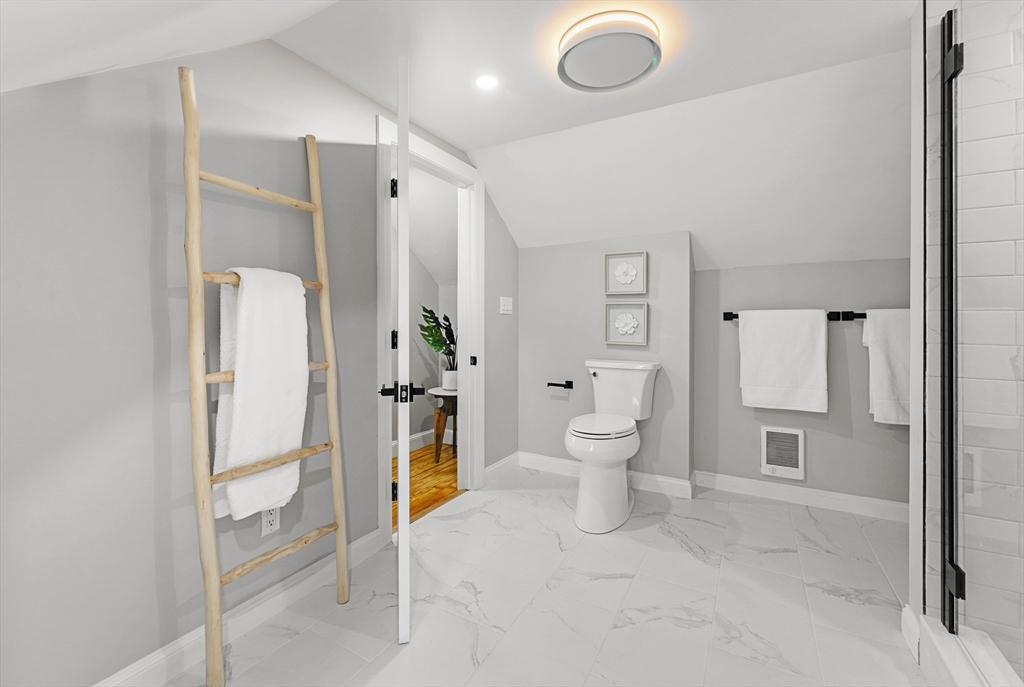 7 Webster Street Randolph, MA 02368 - Photo 23 of 32 a bathroom with a bathtub and a toilet