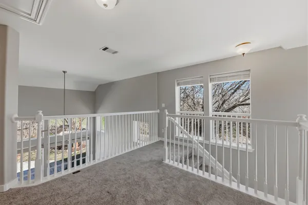 a view of entryway with stairs