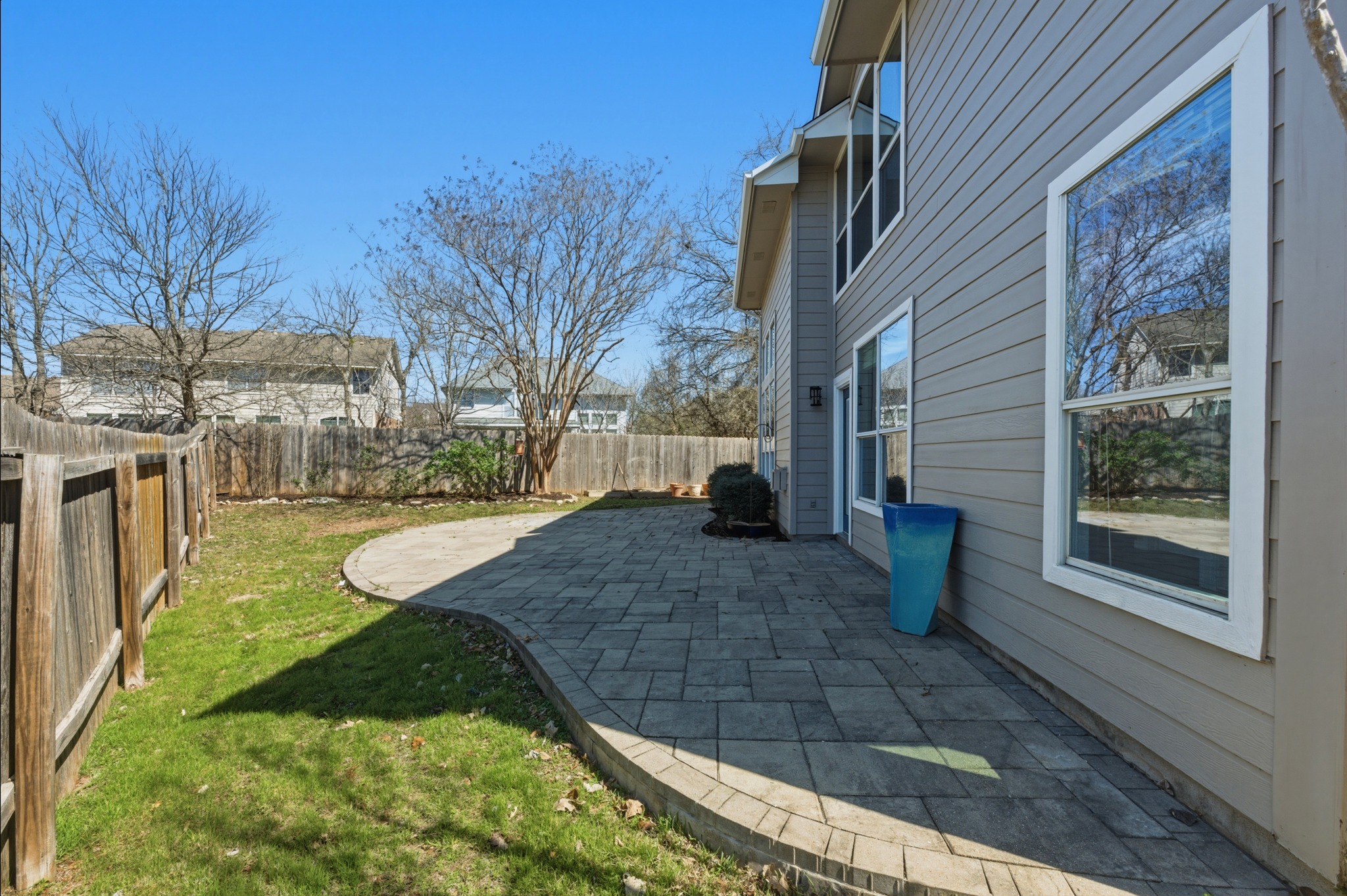 6810 Poncha Pass Austin, TX 78736 - Photo 31 of 35 a view of a house with a yard