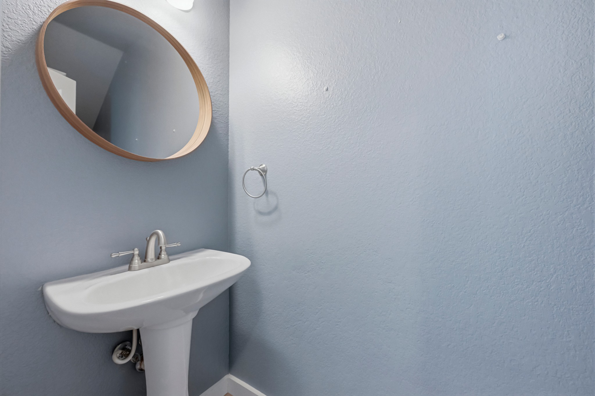 6810 Poncha Pass Austin, TX 78736 - Photo 7 of 35 a bathroom with a sink and mirror