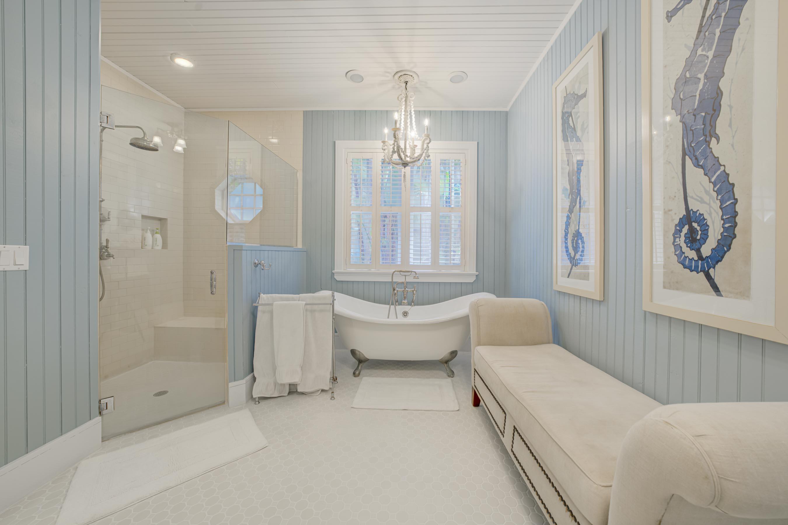 5270 Pennock Point Road Jupiter, FL 33458 - Photo 17 of 60 a spacious bedroom with a bed and a chandelier