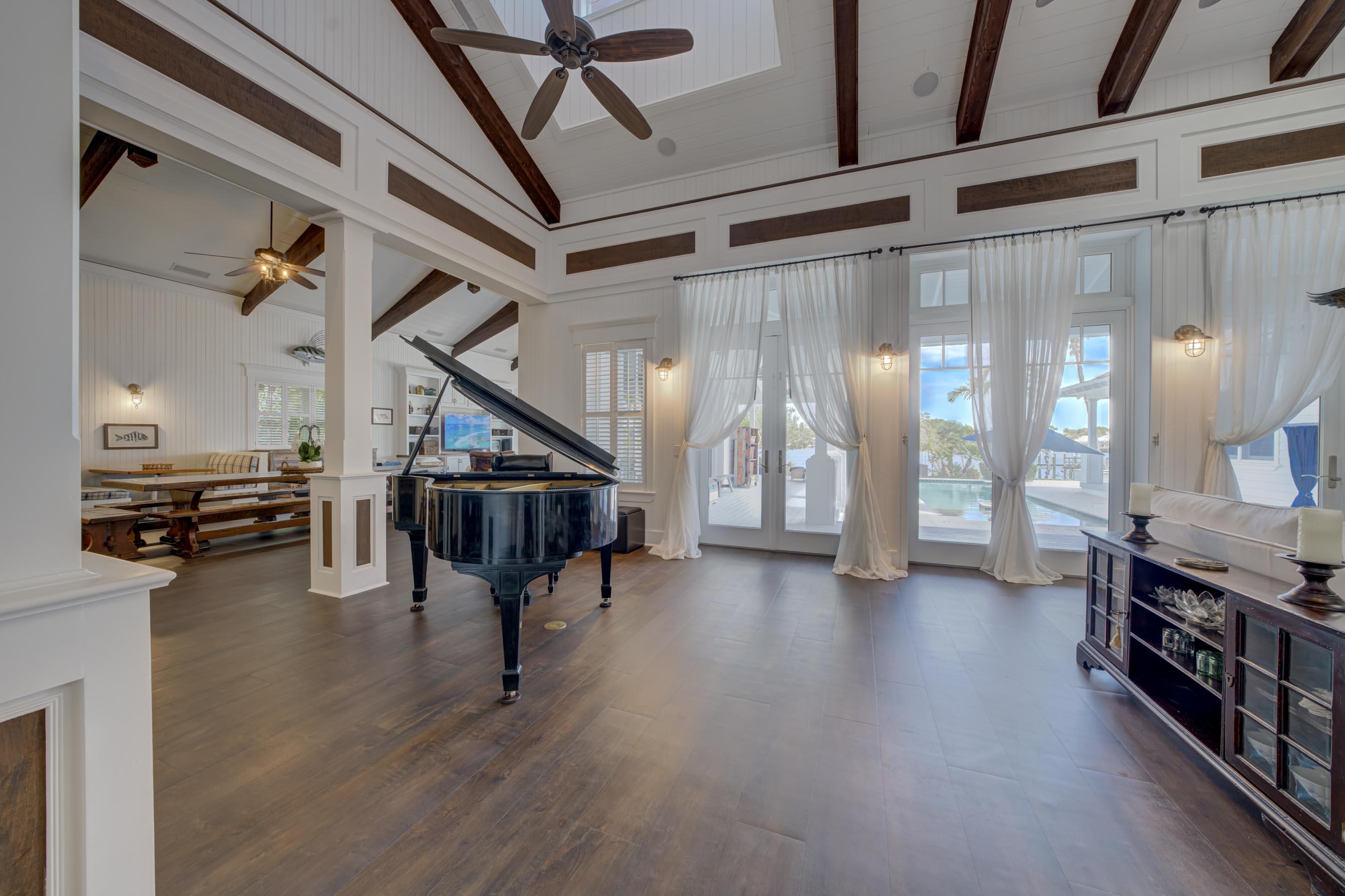 5270 Pennock Point Road Jupiter, FL 33458 - Photo 24 of 60 a view of entryway and hall with wooden floor