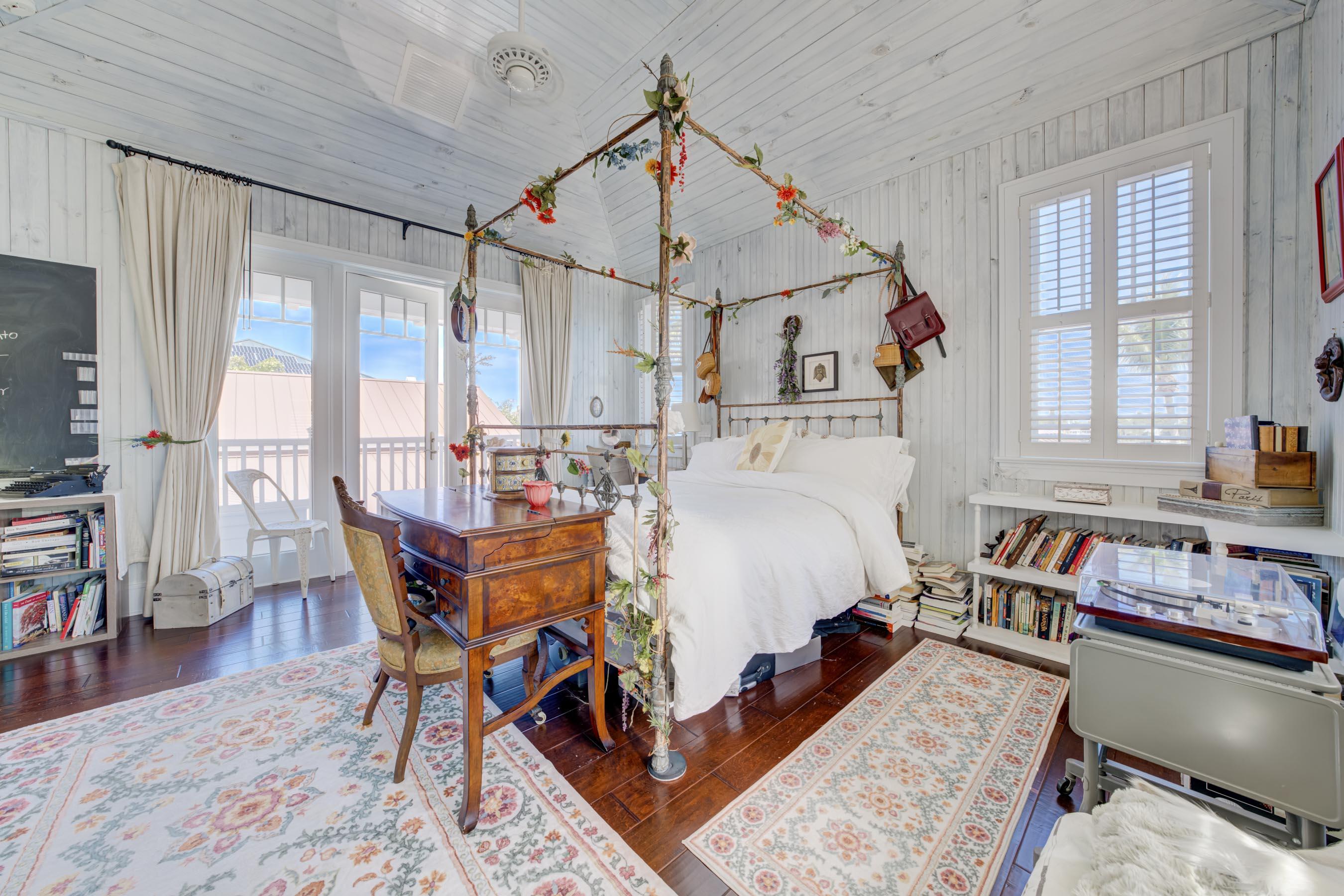 5270 Pennock Point Road Jupiter, FL 33458 - Photo 38 of 60 a bed room with furniture and a window