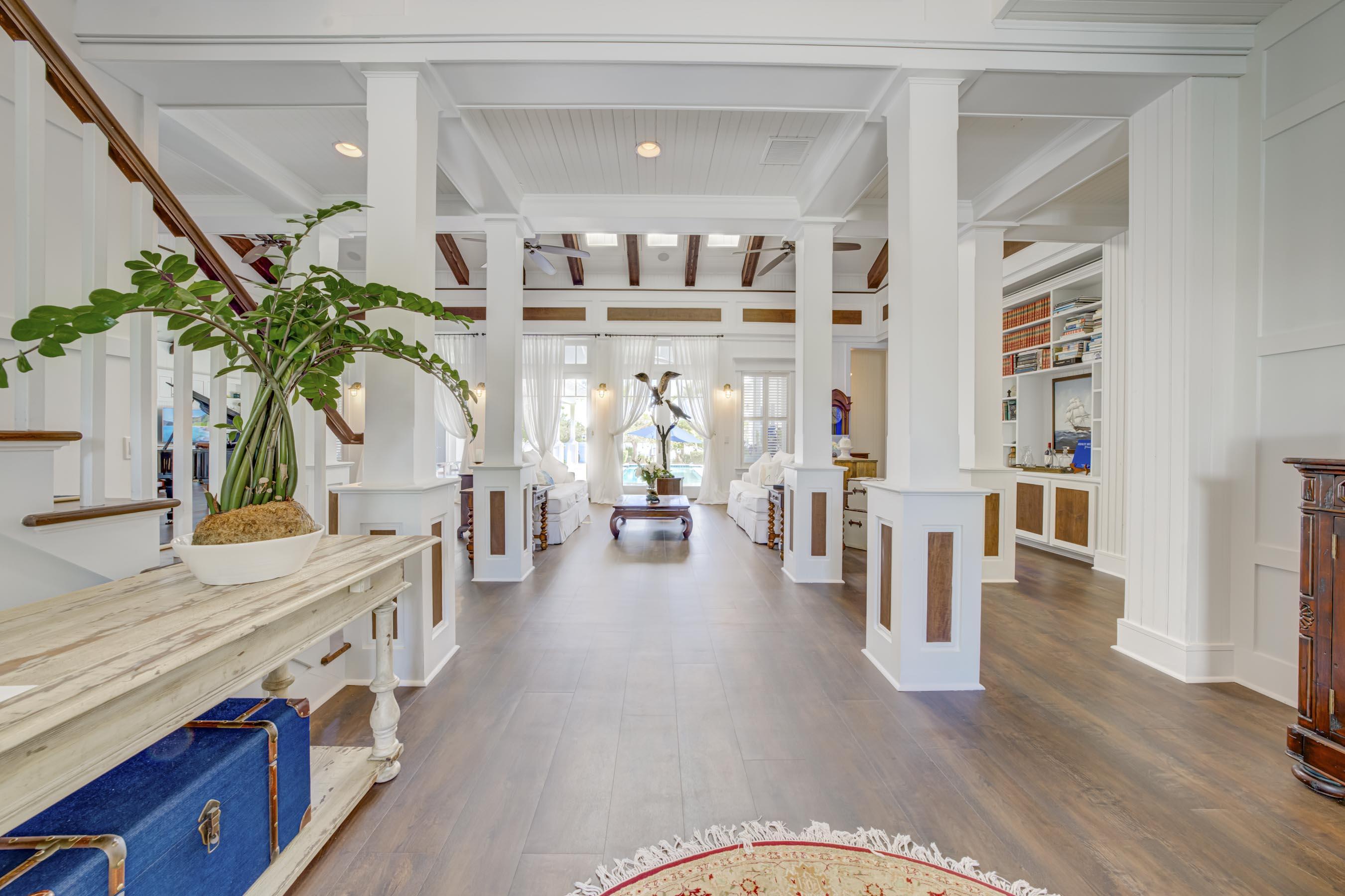 5270 Pennock Point Road Jupiter, FL 33458 - Photo 8 of 60 a living room with furniture and a potted plant