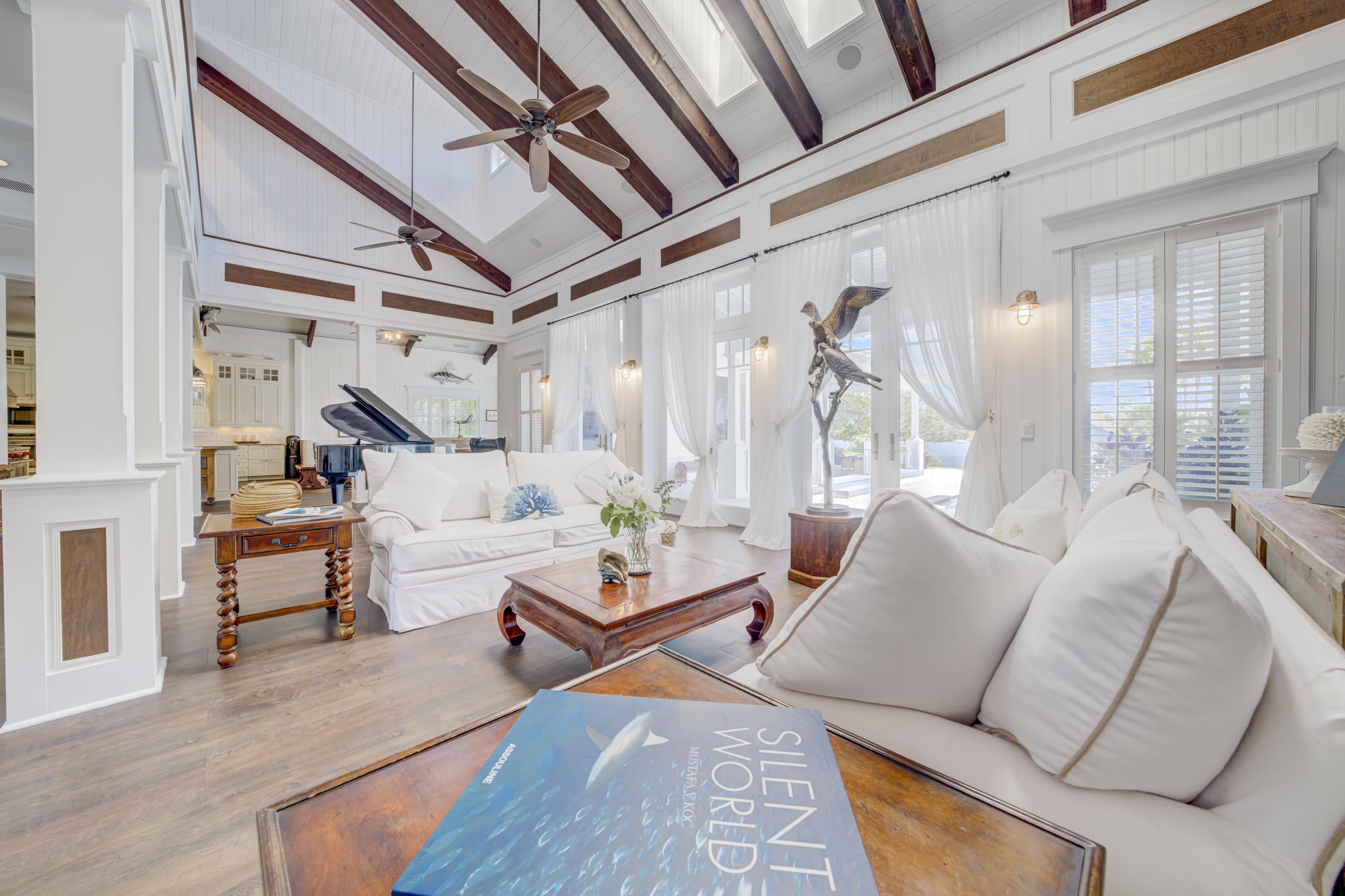 5270 Pennock Point Road Jupiter, FL 33458 - Photo 9 of 60 a living room with furniture and wooden floor