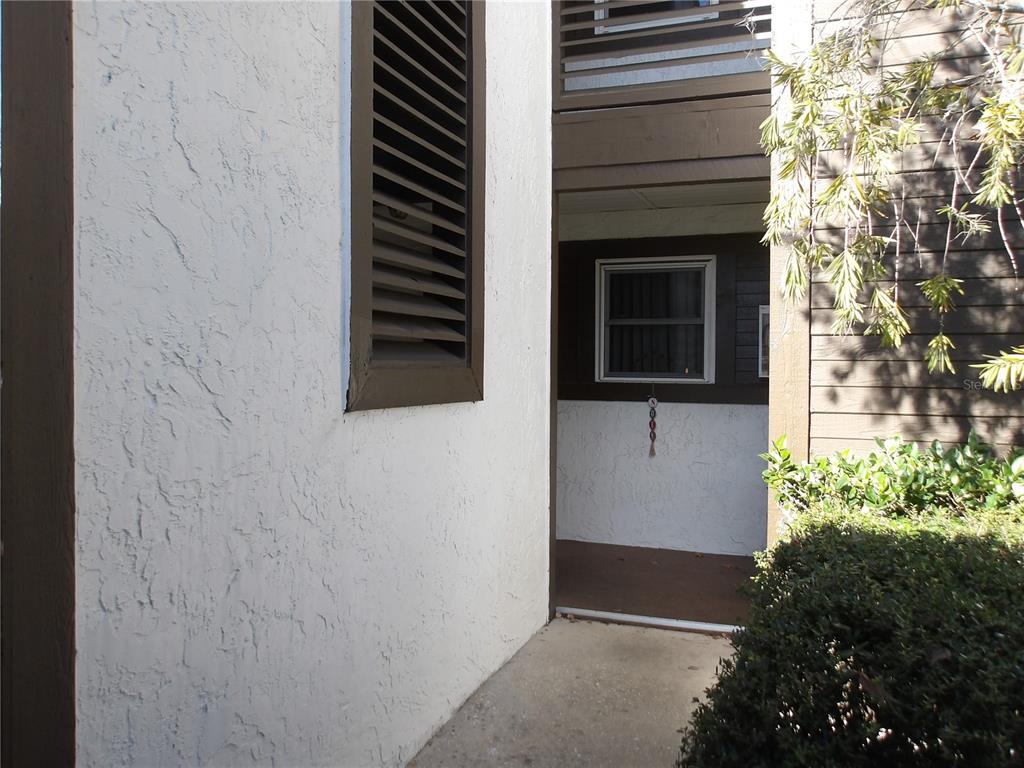4140 Passport Lane, Unit 101 New Port Richey, FL 34653 - Photo 2 of 40 a view of entryway