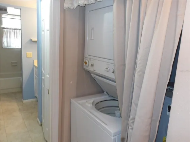 a bathroom with a glass door shower