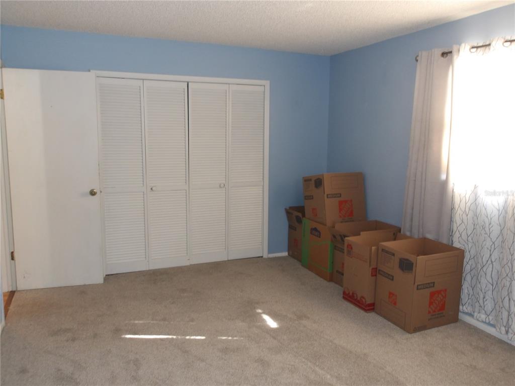 4140 Passport Lane, Unit 101 New Port Richey, FL 34653 - Photo 29 of 40 a view of workspace with furniture