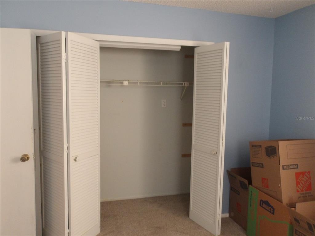 4140 Passport Lane, Unit 101 New Port Richey, FL 34653 - Photo 31 of 40 a room with storage and utility