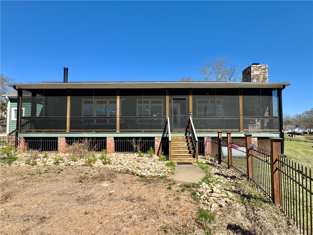 212 Holland Ford Road Pelzer, SC 29669 - Photo 23 of 46 Back of house with screened porch