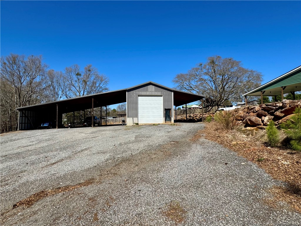 212 Holland Ford Road Pelzer, SC 29669 - Photo 35 of 46 Barn / Shed with Parking Area