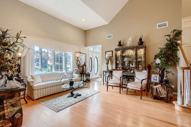 21 South Cowley Road Riverside, IL 60546 - Photo 4 of 50 a living room with furniture and a large window