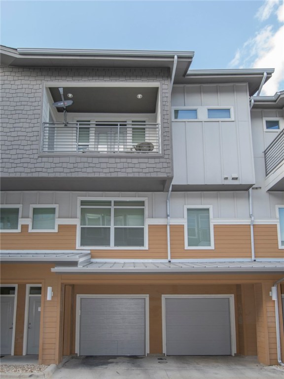 a view of building with large windows