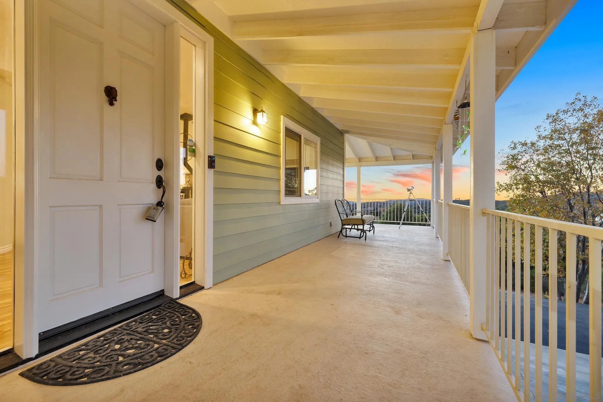 17735 Harrison Park Road Julian, CA 92036 - Photo 11 of 43 a view of a porch with wooden floor and a rug