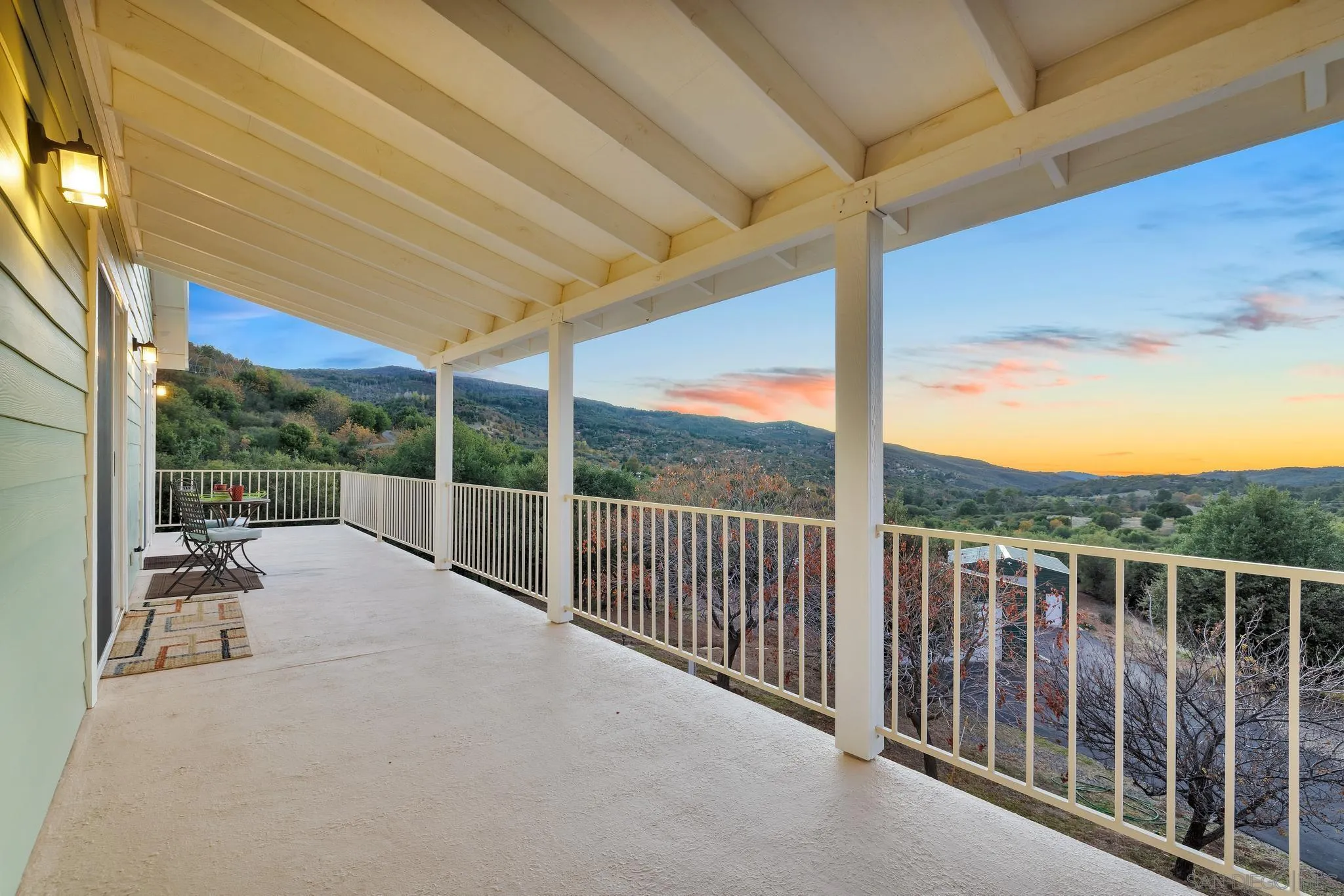 17735 Harrison Park Road Julian, CA 92036 - Photo 12 of 43 a view of a two chair under an umbrella