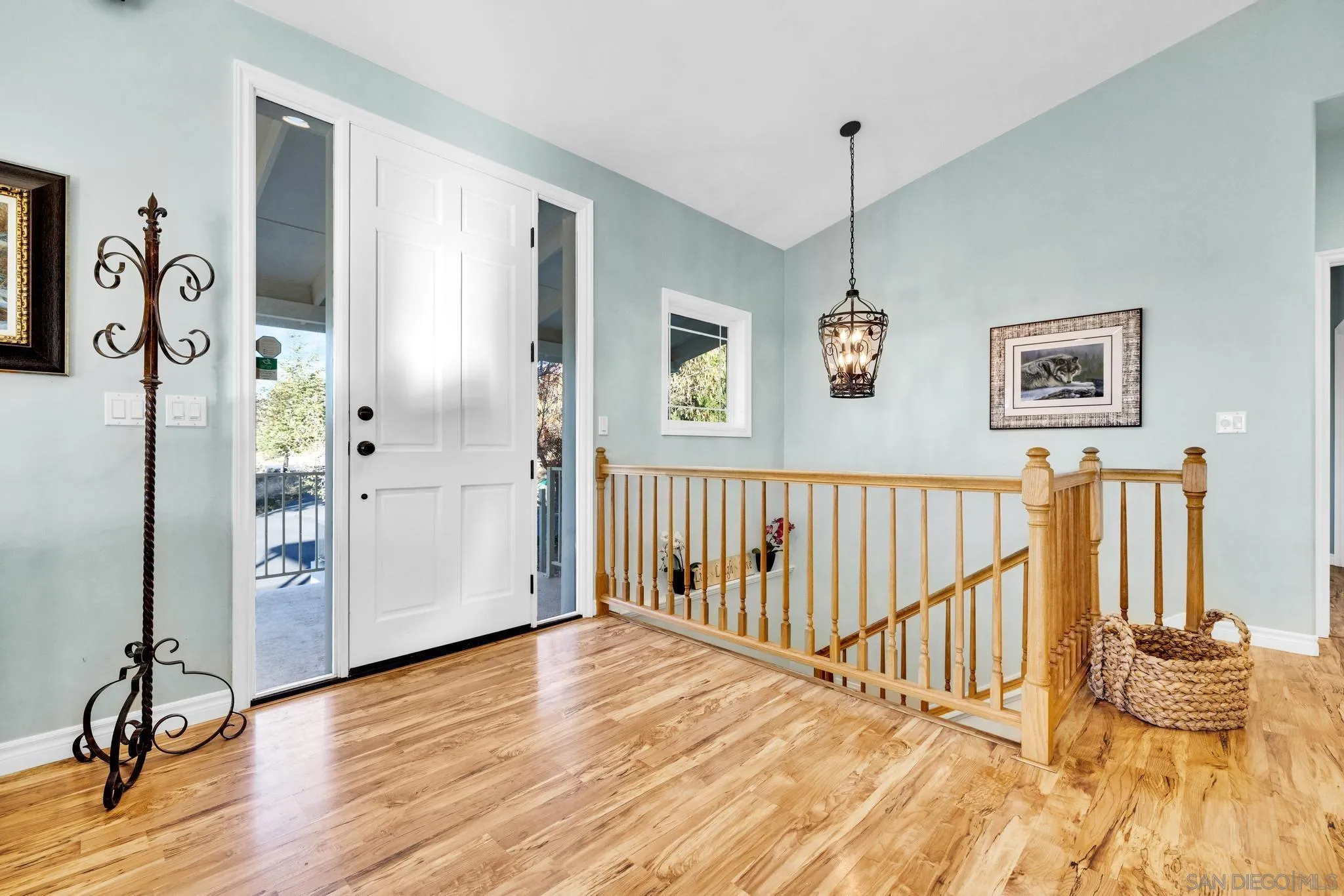 17735 Harrison Park Road Julian, CA 92036 - Photo 14 of 43 a view of a hallway with wooden floor and windows