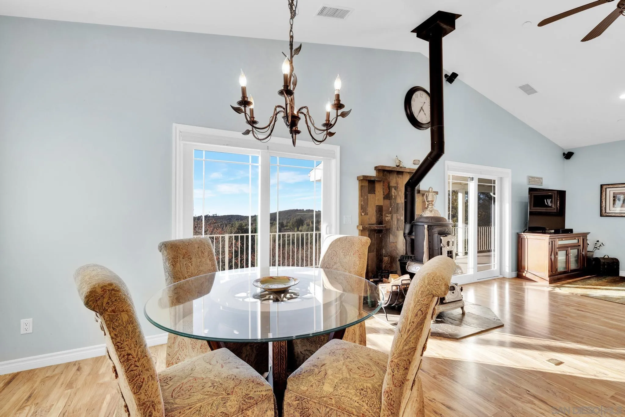 17735 Harrison Park Road Julian, CA 92036 - Photo 21 of 43 a view of a dining room with furniture window and wooden floor