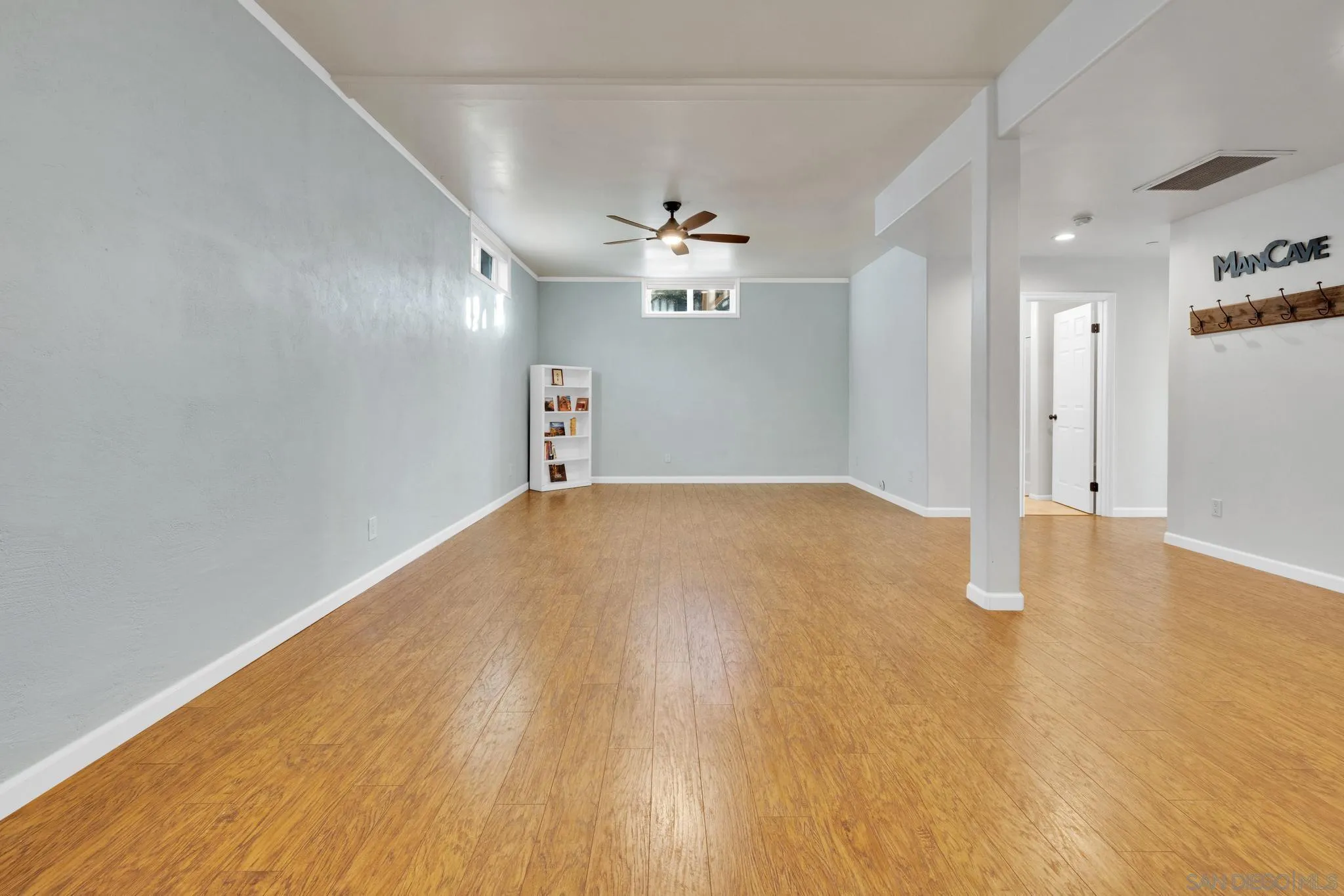 17735 Harrison Park Road Julian, CA 92036 - Photo 31 of 43 wooden floor in an empty room with a window
