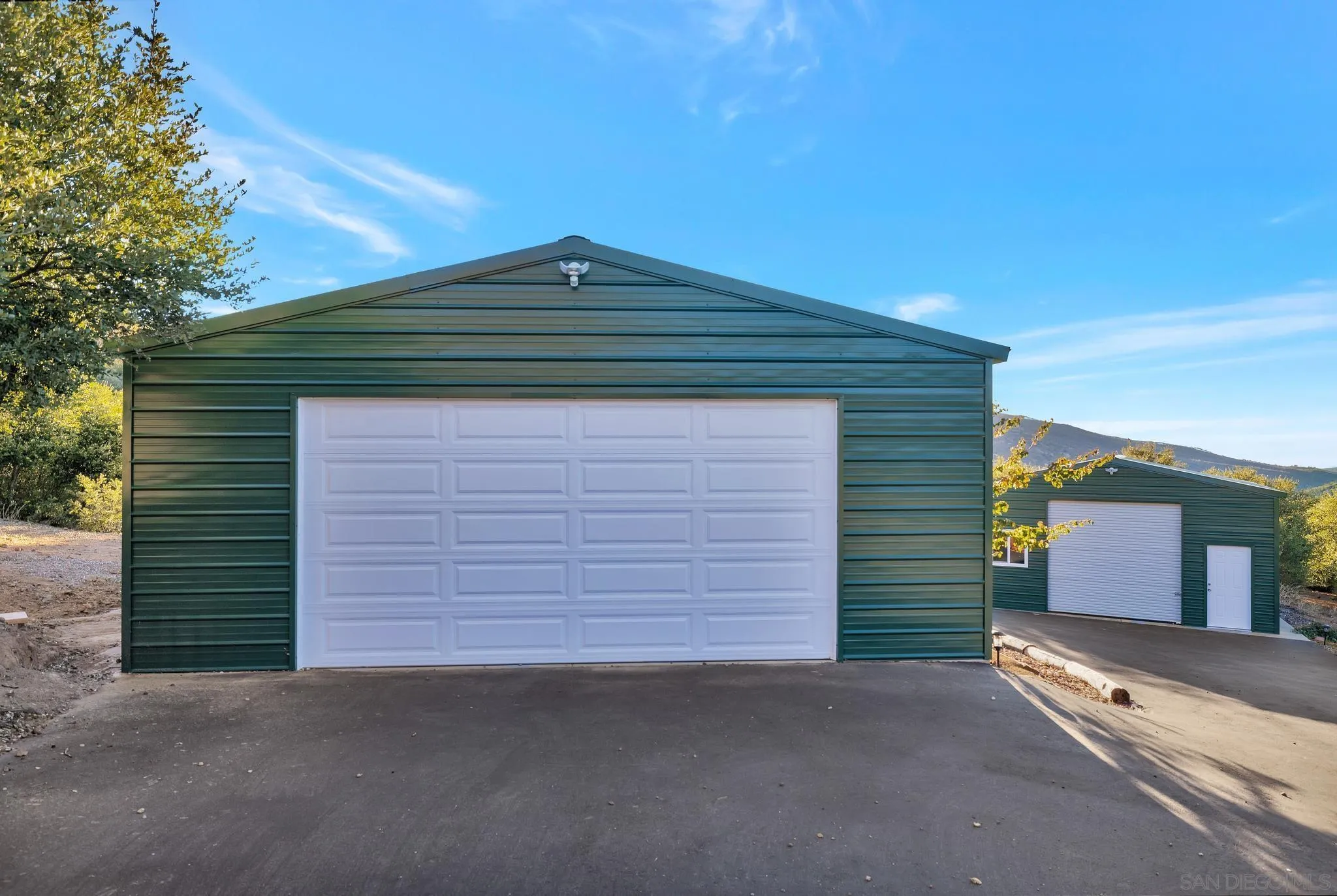 17735 Harrison Park Road Julian, CA 92036 - Photo 40 of 43 a front view of a house with a garage